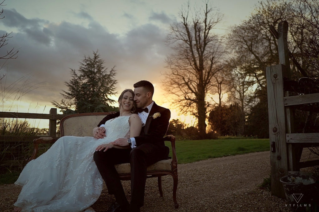 Bride and Groom at sunset at Cambridgeshire wedding venue Bassmead Manor Barns filmed by Videographer VT FILMS