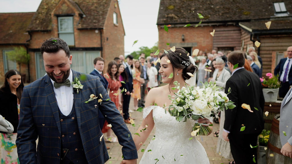 wedding videographer Bassmead manor barns couple confetti