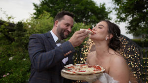 wedding videographer Bassmead manor barns couple pizza oven