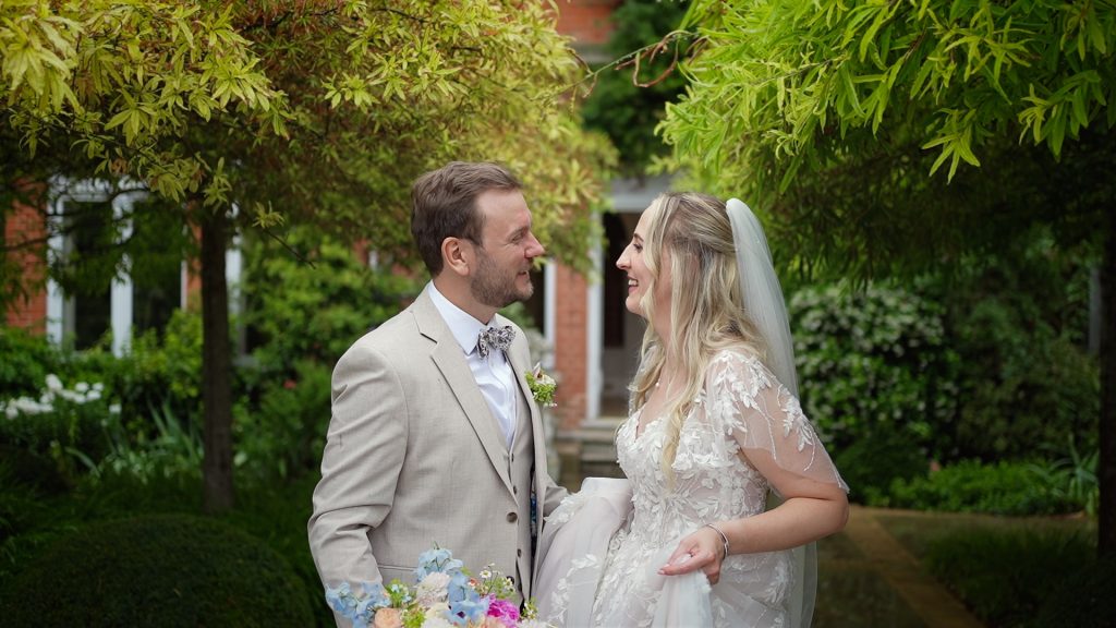 Wedding couple in the gardens at Chippenham Park